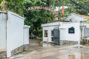 a building with a sign that reads amphipolisseinsein istg at Gorgeous Grand 1000m2 Villa - 5BR with pool in D2 by Ray 02 in Ho Chi Minh City