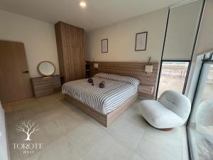 Postel nebo postele na pokoji v ubytování Condominio Frente al Mar