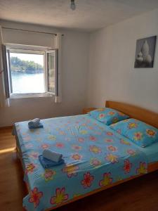 Postel nebo postele na pokoji v ubytování Holiday Home Lucica 4034