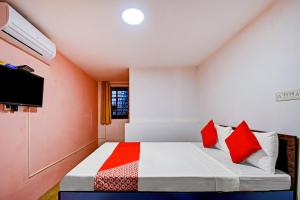 Postel nebo postele na pokoji v ubytování Hotel O Relax Inn