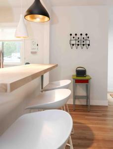 Postel nebo postele na pokoji v ubytování Lalaland Bungalow