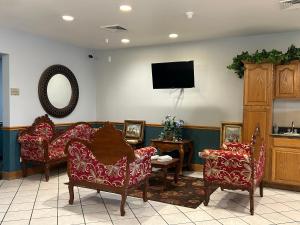 TV a/nebo společenská místnost v ubytování Astoria inn