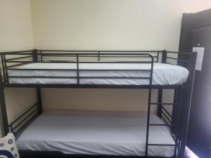 a couple of bunk beds in a room at Angelina's Home and Spa Alexandroupolis in Alexandroupoli