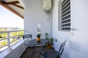 En balkon eller terrasse på Ambre - destination Guyane