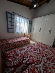 Postel nebo postele na pokoji v ubytování Casa Sol e Mar