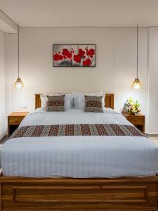 Postel nebo postele na pokoji v ubytování DAshoka guest house