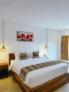 Postel nebo postele na pokoji v ubytování DAshoka guest house