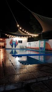 Πισίνα στο ή κοντά στο Sunshine Room Surf City El Tunco