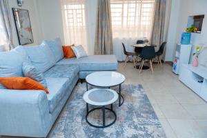 Et opholdsområde på Pearl Furnished Apartment