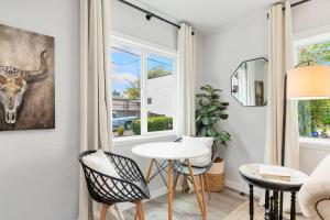 a room with a table and chairs and a window at Downtown location Near the Beach Dog Friendly in Edmonds