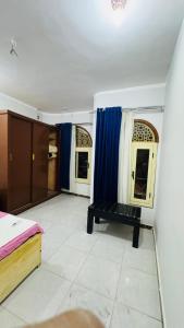 Ένα ή περισσότερα κρεβάτια σε δωμάτιο στο Memnoun house