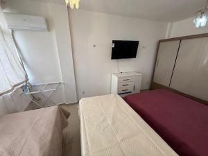 Postel nebo postele na pokoji v ubytování 1 Quarto até 4 Hospedes