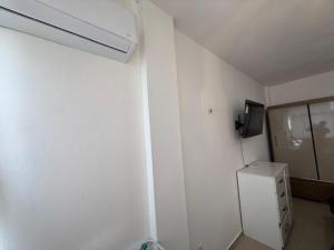 TV a/nebo společenská místnost v ubytování 1 Quarto até 4 Hospedes