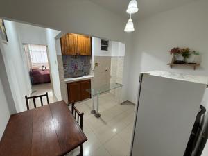 Kuchyň nebo kuchyňský kout v ubytování 1 Quarto até 4 Hospedes