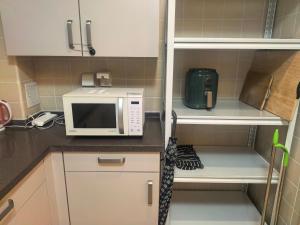 Køkken eller tekøkken på Tidewhisper Deluxe Suite 1 -2 Bedrooms, 2 Bathrooms