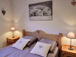 Ένα ή περισσότερα κρεβάτια σε δωμάτιο στο Appartement 2 chambres, pied de piste, parking, 6 personnes - FR-1-836-18