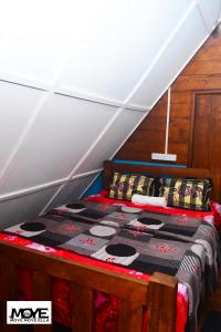 a bedroom with a bed in a tent at moye moye Ella in Ella