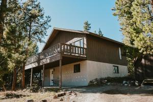 a house with a balcony on the side of it at Breck Ski Chalet, Pet Friendly, Private Hot Tub and Scenic Views in Breckenridge