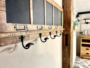 a shelf on the wall of a kitchen at Bramasole - Wohnung mit Carport in Cottbus +24 photos