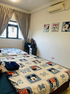 Postel nebo postele na pokoji v ubytování Legoland JB AGhome Medini 3room8pax bukit indah + 84 fotografií