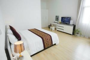 Μια τηλεόραση ή/και κέντρο ψυχαγωγίας στο K-BOSS Hotel +29 φωτογραφίες