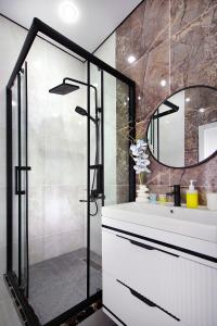 Ένα μπάνιο στο Современный апартамент в центре Алматы, Mega Park - Arbat