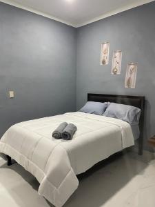 Ένα ή περισσότερα κρεβάτια σε δωμάτιο στο Estancia Sofia