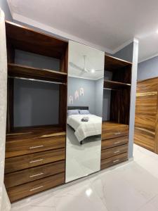 Ένα ή περισσότερα κρεβάτια σε δωμάτιο στο Estancia Sofia