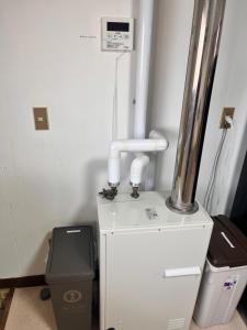 a kitchen with a sink and a mixer in a room at Tomoeドットコム3 music stay in Hakodate +21 photos