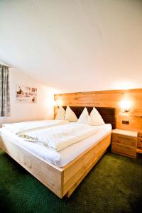 Ένα ή περισσότερα κρεβάτια σε δωμάτιο στο Apartments in Flachau - Salzburger Land 316