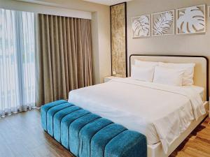 Ένα ή περισσότερα κρεβάτια σε δωμάτιο στο Villa gần biển Sanctuary Hồ Tràm Vũng Tàu