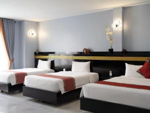 Postel nebo postele na pokoji v ubytování Haiven Hotel & Restaurant