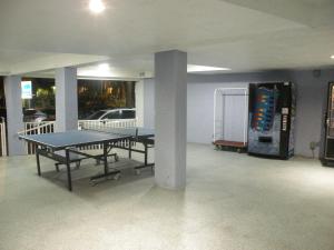 Instalaciones para jugar al ping pong en Pelican Pointe Hotel o alrededores