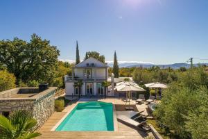 an aerial view of a house with a swimming pool at Villa 5 elements in Gostinjac