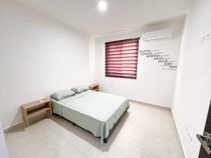 Una cama o camas en una habitación de New luxury apartament in Playa del Carmen 20 fotos más