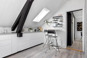 Η κουζίνα ή μικρή κουζίνα στο Porsgrunn city center - modern apartment with garage