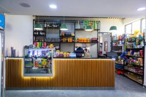a store with a yellow counter in a store at Kilimani Chic Studio in Nairobi