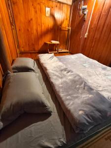 Ένα ή περισσότερα κρεβάτια σε δωμάτιο στο Nùng An homestay-Nùng ethnic group +32 φωτογραφίες