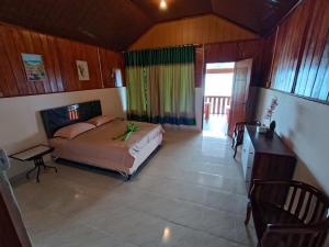 Ένα ή περισσότερα κρεβάτια σε δωμάτιο στο SeaGarden Guesthouse