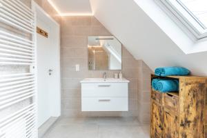 Koupelna v ubytování Alsace Moderne - T2 60 m2, terrasse, fibre & Netflix - Niederbronn-les-Bains