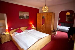 Ένα ή περισσότερα κρεβάτια σε δωμάτιο στο Hotel Gamshof