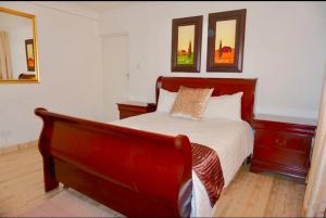 Ένα ή περισσότερα κρεβάτια σε δωμάτιο στο Khanimambo Guest house