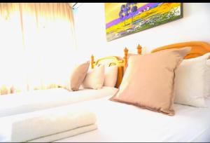 Ένα ή περισσότερα κρεβάτια σε δωμάτιο στο Khanimambo Guest house