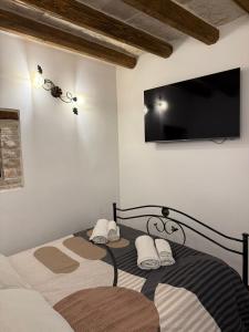 Ένα ή περισσότερα κρεβάτια σε δωμάτιο στο Il Torrione