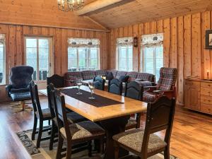 a dining room with a table and chairs at 8 person holiday home in BJELLAND-By Traum in Bjelland