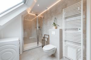 Koupelna v ubytování Alsace Moderne - T2 60 m2, terrasse, fibre & Netflix - Niederbronn-les-Bains