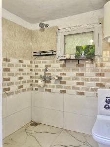 Ένα μπάνιο στο Kala Studio And Stay