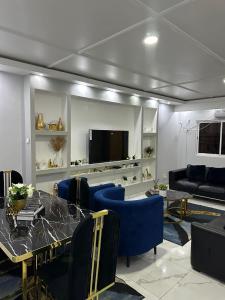 TV a/nebo společenská místnost v ubytování Casa Família Ndombe