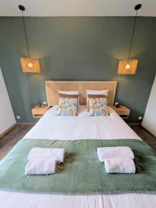 Giường trong phòng chung tại Le 1930, la pause Béthunoise