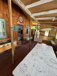 an inside view of a cabin with a rug on the floor at Ancoa Lodge in Linares